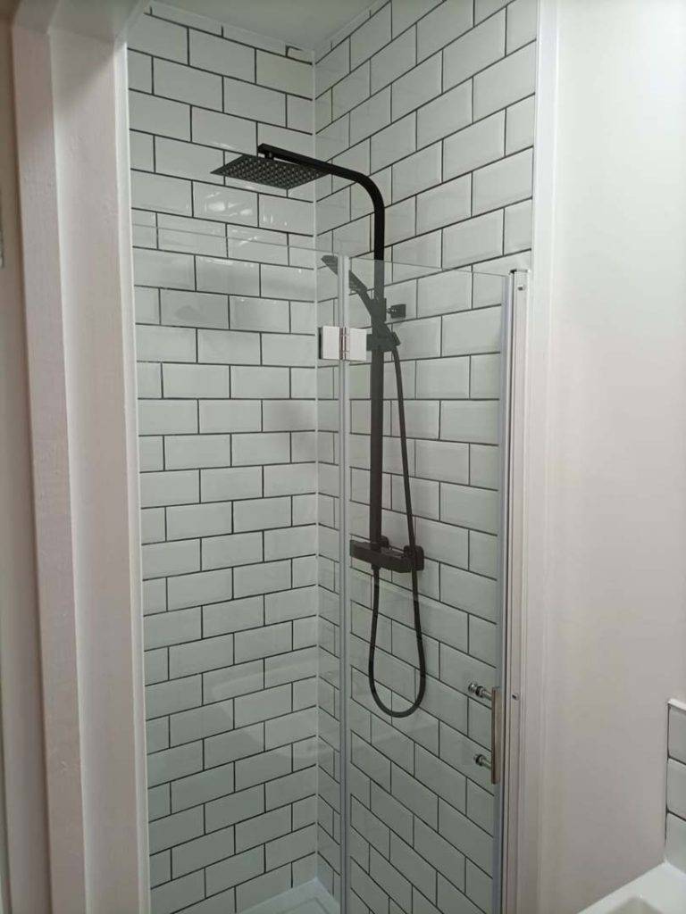 New shower with white brick tiles